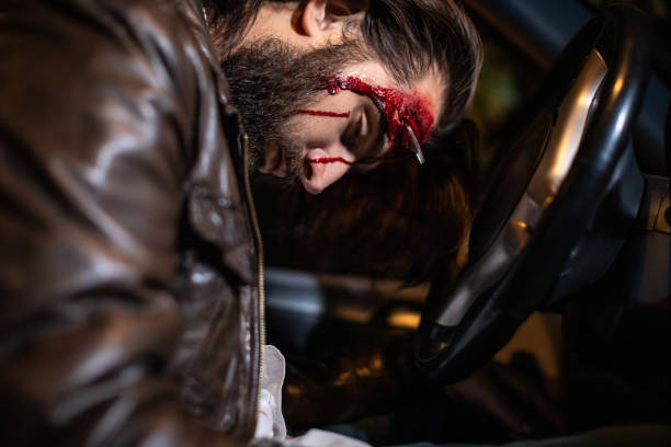 istock Wounded driver sitting in car after car crash 1249775773