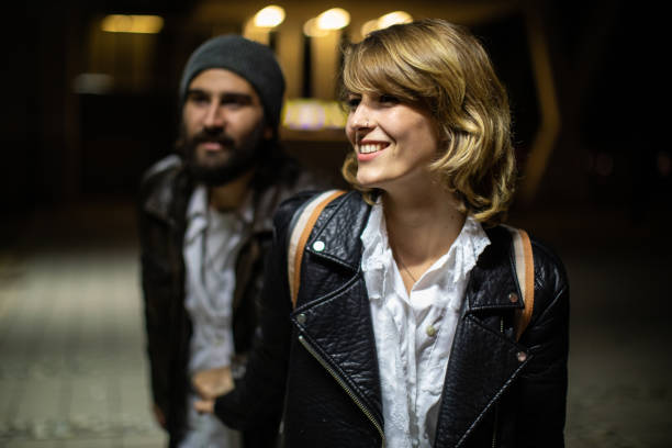 istock Young couple having fun time during date night at city 1249775815