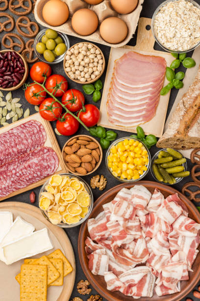istock Bacon in ceramic plate. Cookies corn tomatoes on table. Ingredients for english breakfast. 1249775968