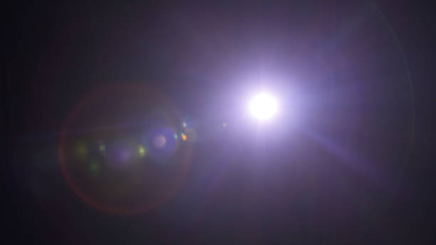 istock Abstract blue Sun flare on the black 1249777158