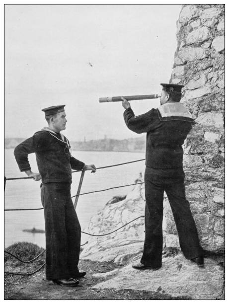 Antique photograph of British Navy and Army: On duty Antique photograph of British Navy and Army: On duty telescope photos stock illustrations