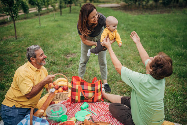 istock Family picnic on the grass 1249779600