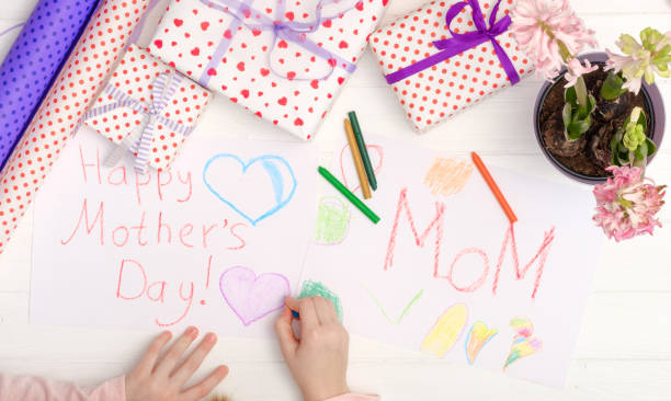 istock Small girl drawing a greeting card 1249782111