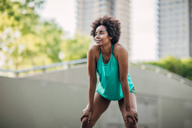 istock Beautiful fit lady in city 1249788010