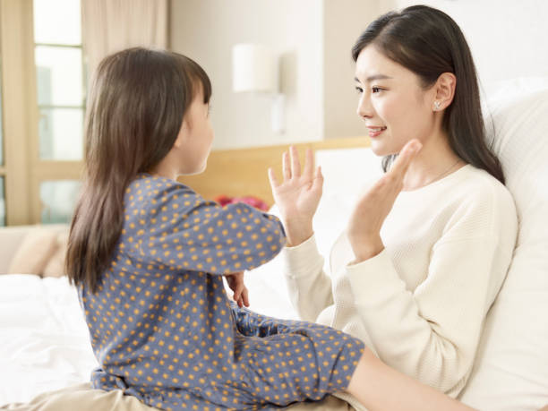 istock asian mother and daughter playing at home 1249788646