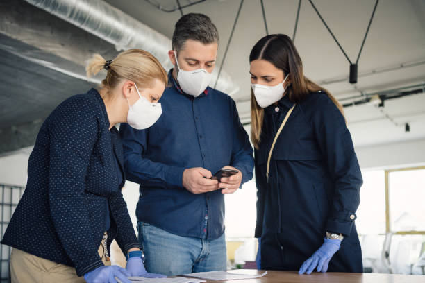 istock A team of young architects discusses the project on the construction site 1249791113