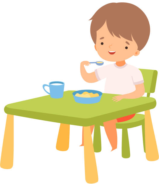 stockillustraties, clipart, cartoons en iconen met leuke jongen die ontbijt bij de lijst eet, de dagelijkse illustratie van de activiteit van de kind van de kleuters - jongen peuter eten