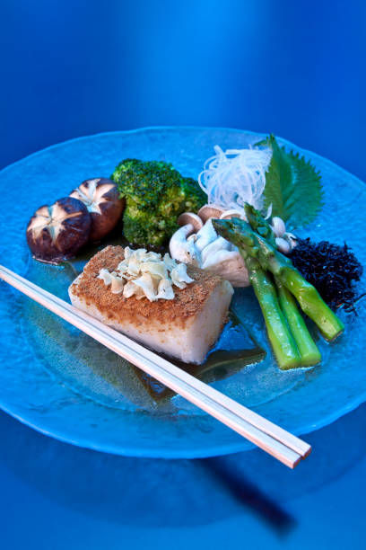 рыба на синем - asian cuisine blue japanese culture still life стоковые фото и изображения