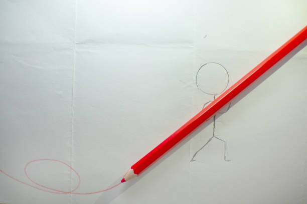 istock red pencil and paper white abstract background 1249798161