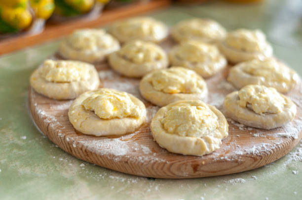 istock The process of making pies with cottage cheese. Raw pies 1249798749