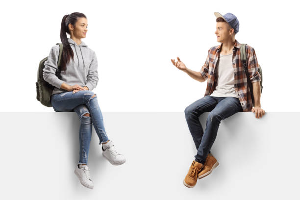 istock Male and female students sitting on a panel and talking 1249799297