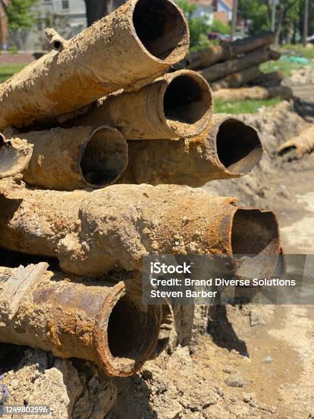 Lead Pipes Stock Photo - Download Image Now - Flint - Michigan, Lead, Crisis