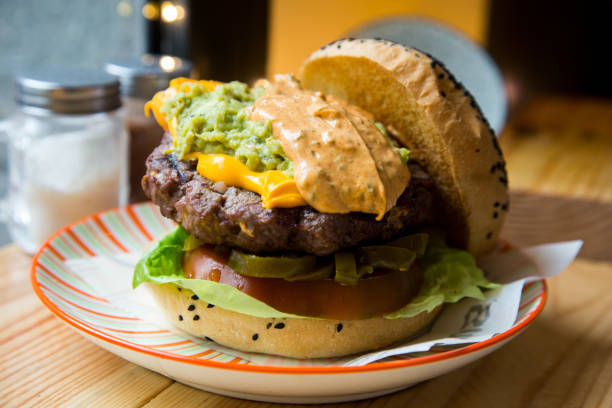 istock Gourmet burger with delicious toppings 1249806788