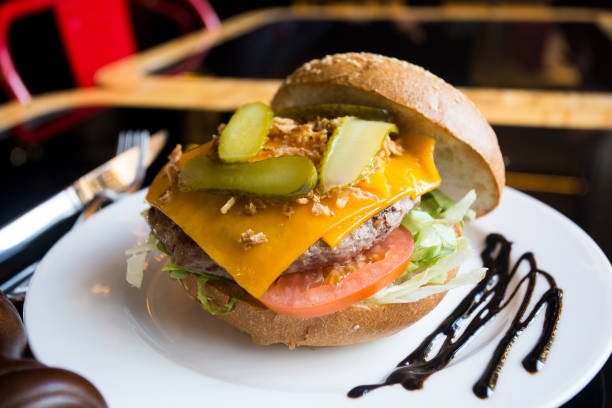istock Gourmet burger with delicious toppings 1249808309