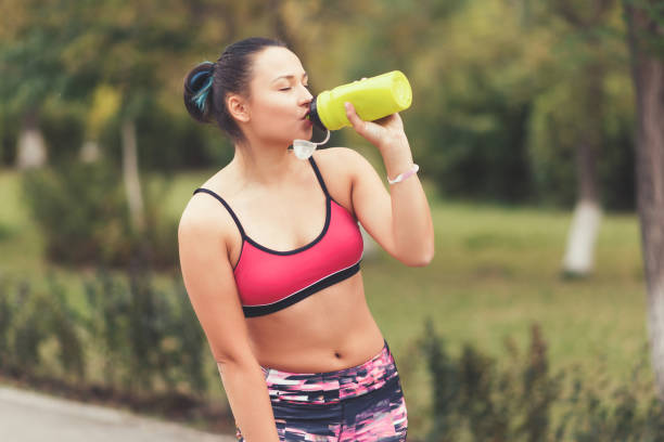 istock runner getting thirsty after the sport 1249809279