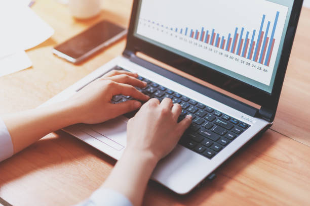 istock Woman working at home office hand on keyboard close up 1249809294