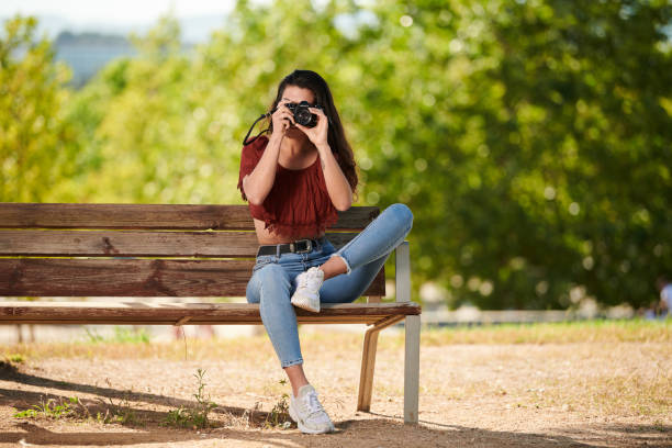 istock ready to take pictures of her boyfriend 1249813402