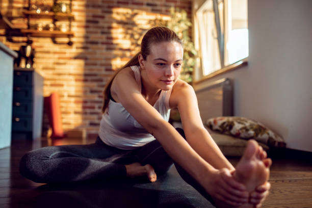 istock Woman doing the Janu Sirsasana Pose 1249816977