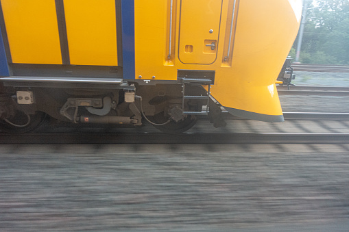 motion blurred track with close up overtaken train