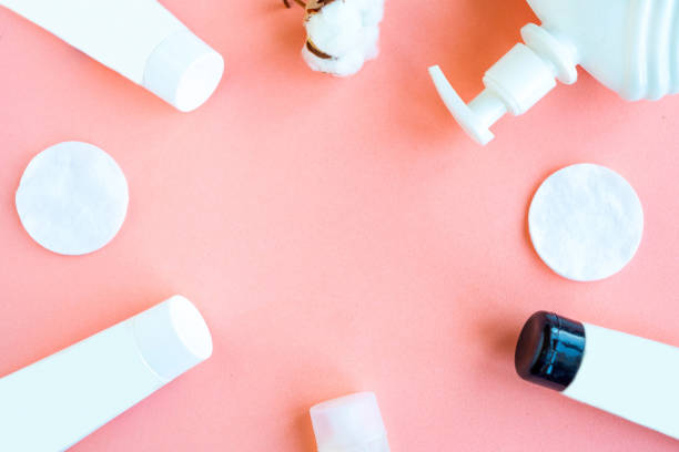 istock Frame of white cosmetics bottles, top view, copy space 1249818783