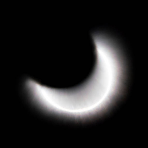 Light flare in the form of a Crescent on a black background