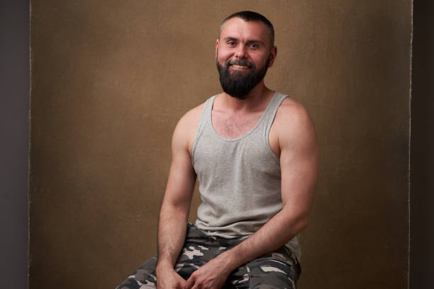 istock Strong bearded man. Portrait of a handsome man with a beard 1249821095