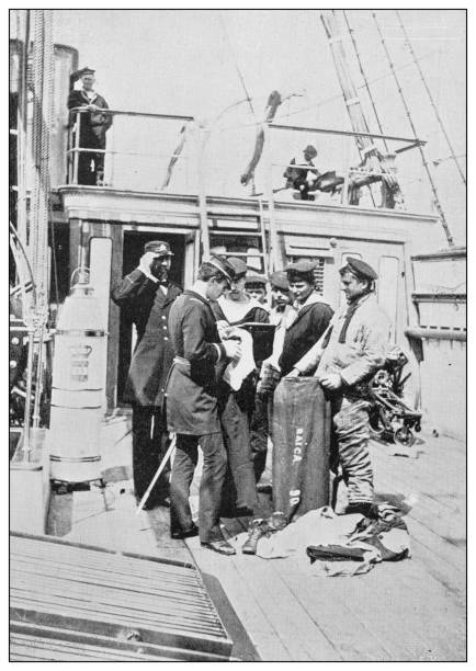istock Antique photograph of British Navy and Army: Inspecting a seaman's kit 1249821632