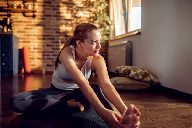 istock Woman doing the Janu Sirsasana Pose 1249822584