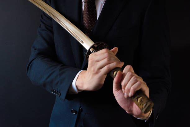 istock The man holding japanese sword 1249822722