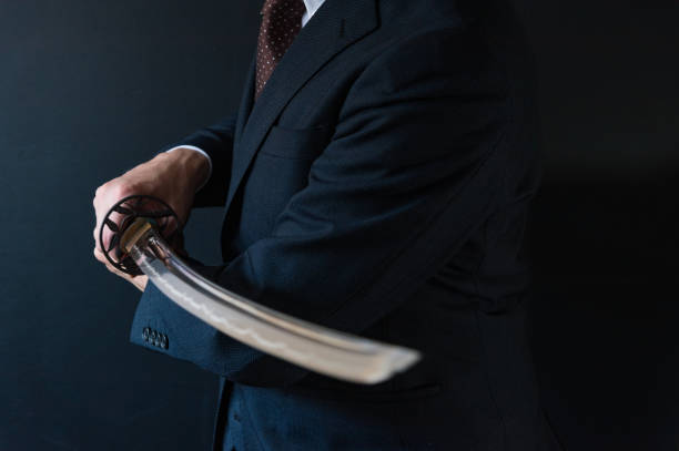 istock The man holding japanese sword 1249823728