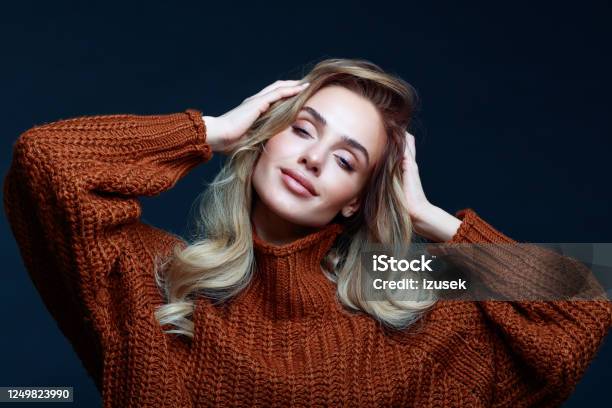 Autumn Portrait Of Blond Hair Woman In Brown Sweater Stock Photo - Download Image Now