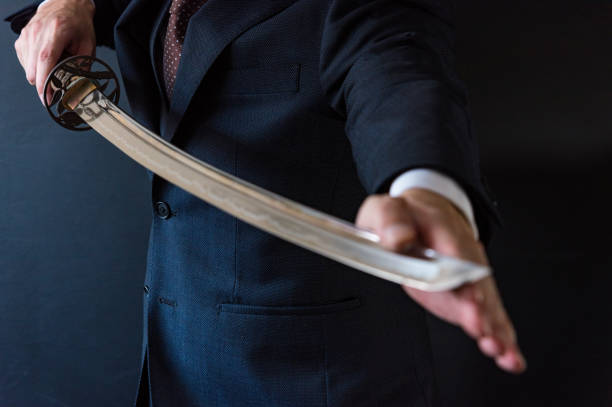 istock The man holding japanese sword 1249824278