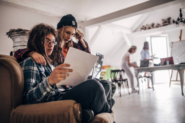 istock Team of young designers  cooperating in the office 1249826197