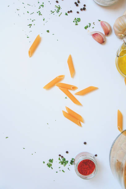 Top view of pasta on a white board background