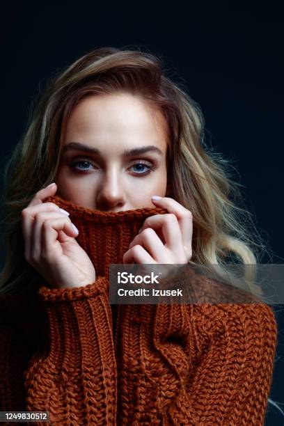 Headshot Of Blond Hair Woman In Brown Sweater Stock Photo - Download Image Now - Sweater, Autumn, Women