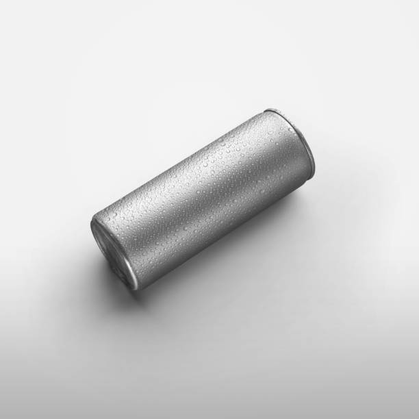 istock Metal packaging template with water drops isolated on background, silver shiny bottle with a refreshing drink. 1249831135