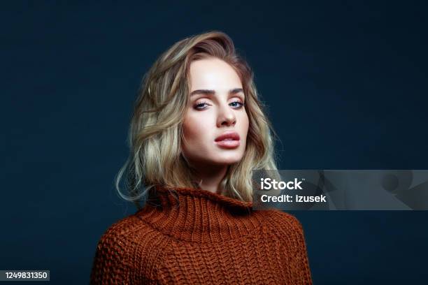 Headshot Of Blond Hair Woman In Brown Sweater Stock Photo - Download Image Now - Blond Hair, One Woman Only, Only Women