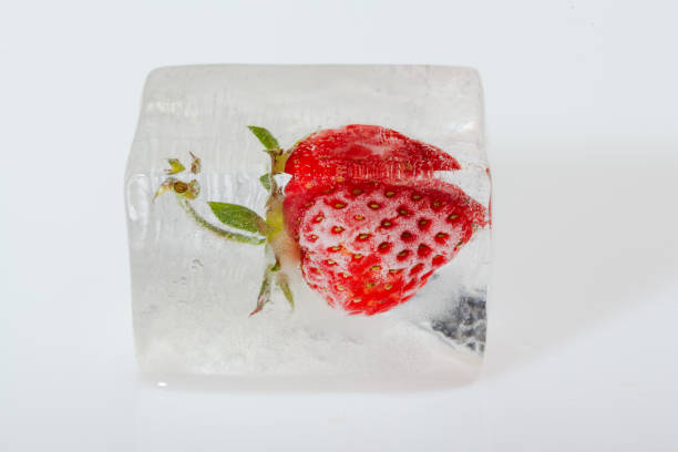 istock Strawberries frozen in the ice 1249832790