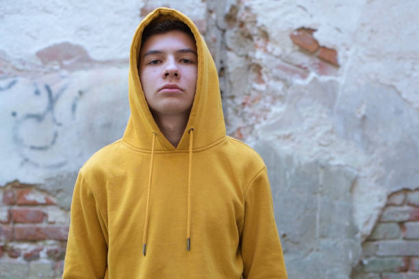 istock a teenager looks at the camera 1249833177
