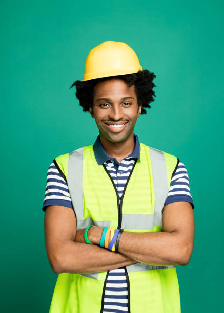 istock Portrait of cheerful construction worker 1249834905