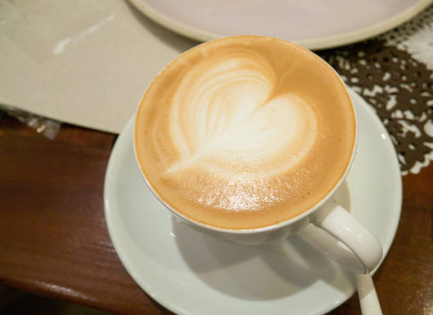istock A cup of coffee with heart pattern in a white cup 1249835230