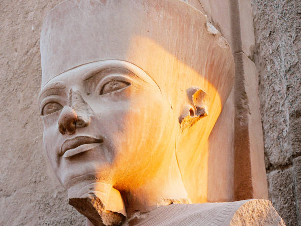 Statue of Pharaoh Ramses II in the great temple of Karnak dedicated to the cult of Amun, in the city of Luxor in Egypt Statue of Pharaoh Ramses II in the great temple of Karnak dedicated to the cult of Amun, in the city of Luxor in Egypt amon photos stock pictures, royalty-free photos & images