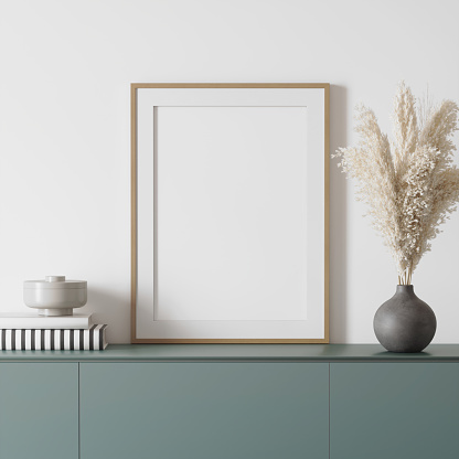 3d white modern mockup with blank framed canvas on a green sideboard, pampas grass in a stone vase