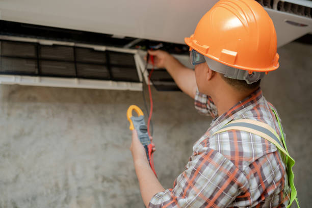 istock Air conditioner repair technician service at home 1249842676