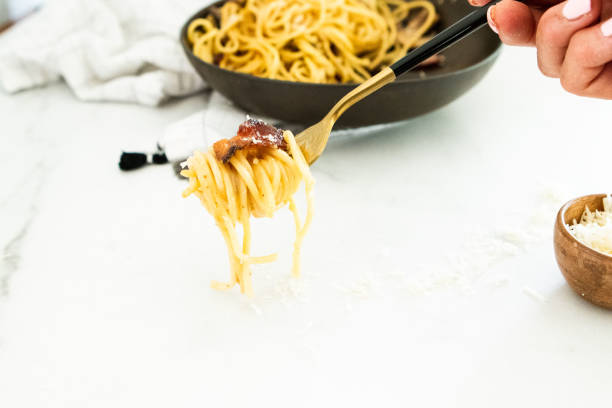 istock FORKFUL OF PRIMAVERA CARBONARA PASTA 1249844724