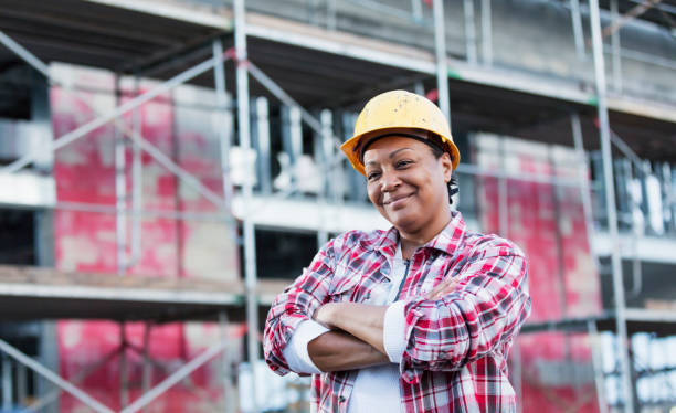 istock African-American woman working at construction site 1249845811