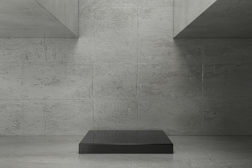 Concrete background with pedestal.