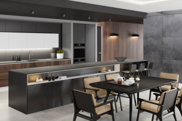 istock Luxurious matte black minimalist kitchen interior with long island table 1249851912