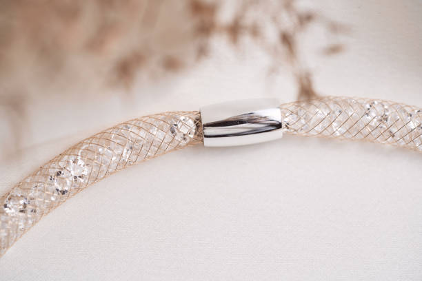 istock Beautiful  bracelet with crystals isolated on white. Magnet closure. 1249852248