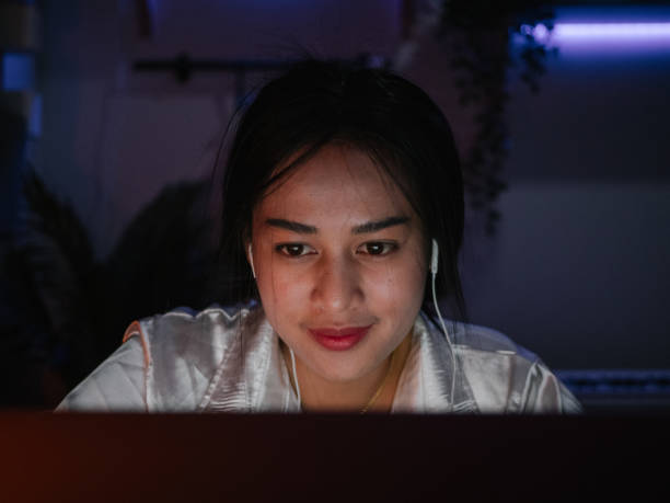 istock Young woman working computer long hours 1249853212